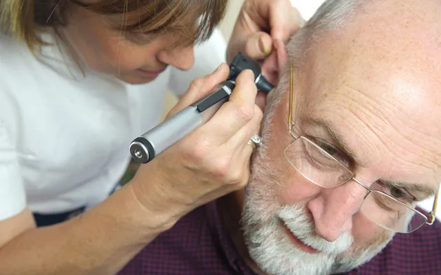 inspecting ear
